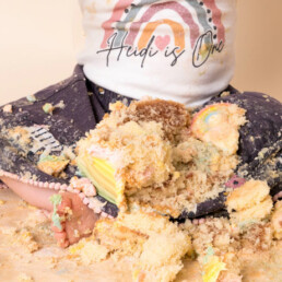 Celebrate-your-baby’s-first-birthday-with-a-joyful-cake-smash-and-splash-session.-Beautiful,-meaningful-portraits-in-Sussex-and-Kent