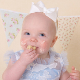 Celebrate-your-baby’s-first-birthday-with-a-joyful-cake-smash-and-splash-session.-Beautiful,-meaningful-portraits-in-Sussex-and-Kent