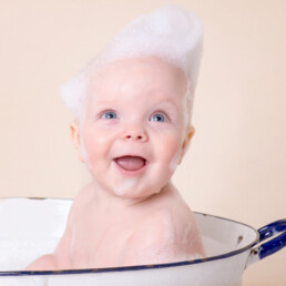 Celebrate-your-baby’s-first-birthday-with-a-joyful-cake-smash-and-splash-session.-Beautiful,-meaningful-portraits-in-Sussex-and-Kent