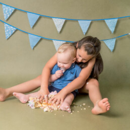 Celebrate-your-baby’s-first-birthday-with-a-joyful-cake-smash-and-splash-session.-Beautiful,-meaningful-portraits-in-Sussex-and-Kent