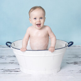 Celebrate-your-baby’s-first-birthday-with-a-joyful-cake-smash-and-splash-session.-Beautiful,-meaningful-portraits-in-Sussex-and-Kent