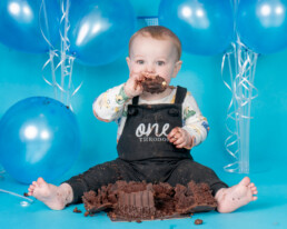 Celebrate-your-baby’s-first-birthday-with-a-joyful-cake-smash-and-splash-session.-Beautiful,-meaningful-portraits-in-Sussex-and-Kent