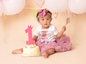 Celebrate-your-baby’s-first-birthday-with-a-joyful-cake-smash-and-splash-session.-Beautiful,-meaningful-portraits-in-Sussex-and-Kent