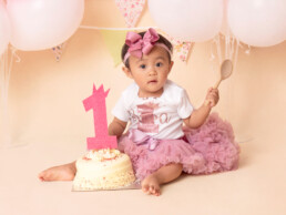 Celebrate-your-baby’s-first-birthday-with-a-joyful-cake-smash-and-splash-session.-Beautiful,-meaningful-portraits-in-Sussex-and-Kent