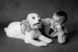 cockerpoo and his human brother share a close freindship